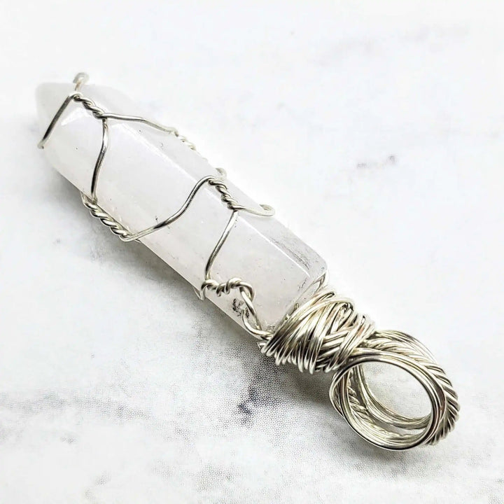 Sterling Silver Messy Wire Wrap Gemstone Crystal Pendant showcasing a unique wire-wrapped crystal design.