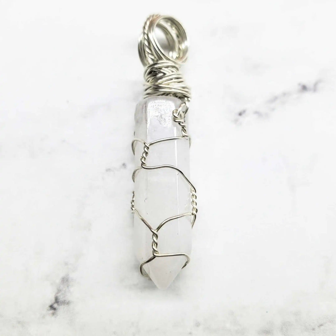 Sterling Silver Messy Wire Wrap Gemstone Crystal Pendant with a unique wire design and crystal point.