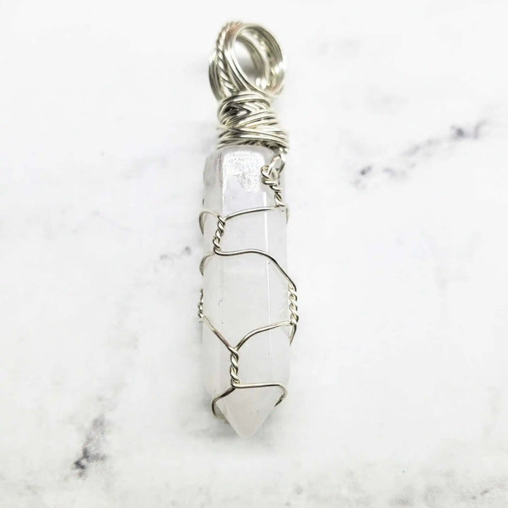 Sterling Silver Messy Wire Wrap Gemstone Crystal Pendant with a unique wire design and crystal point.