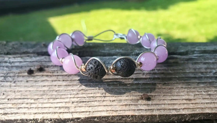 Silver Spiral Twist Wrap Purple Lava Rock Bangle Bracelet featuring purple lava rock beads and sterling silver.
