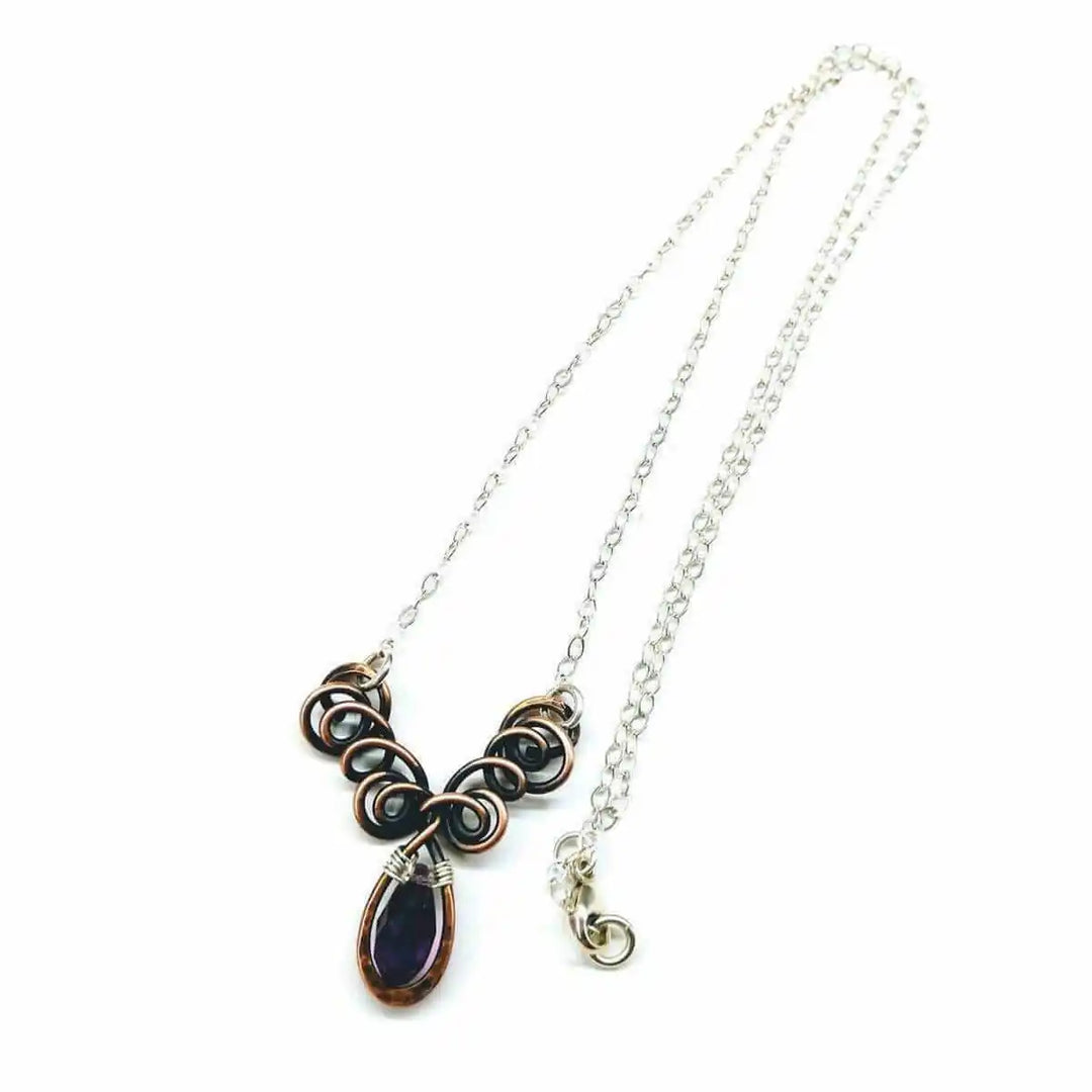 Silver and Copper Wire Sculpted Purple Crystal Drop Necklace with unique drop pendant and sculpted design.