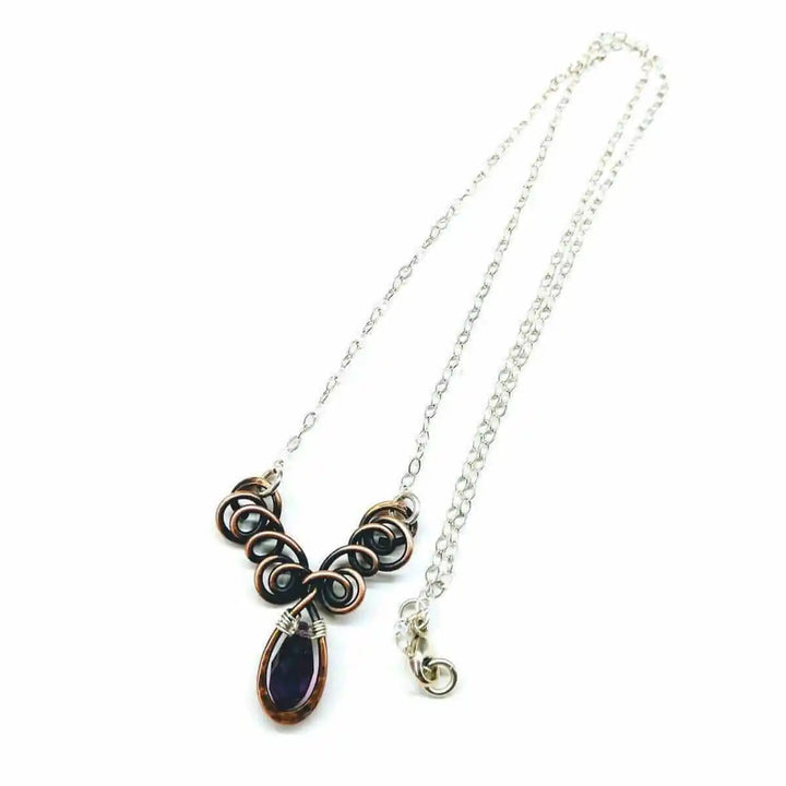 Silver and Copper Wire Sculpted Purple Crystal Drop Necklace with unique drop pendant and sculpted design.