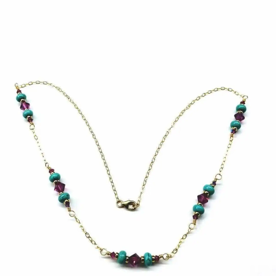 Wire Wrapped Gold Filled Pink Turquoise Gemstone Necklace with turquoise heishi beads and fuchsia Swarovski crystals.