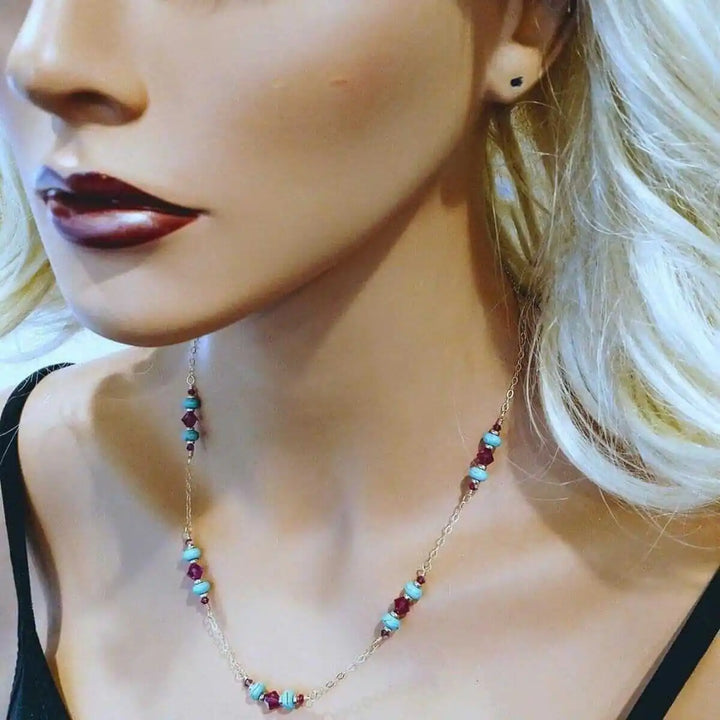 Wire Wrapped Gold Filled Pink Turquoise Gemstone Necklace showcased on a mannequin, featuring turquoise and fuchsia beads.