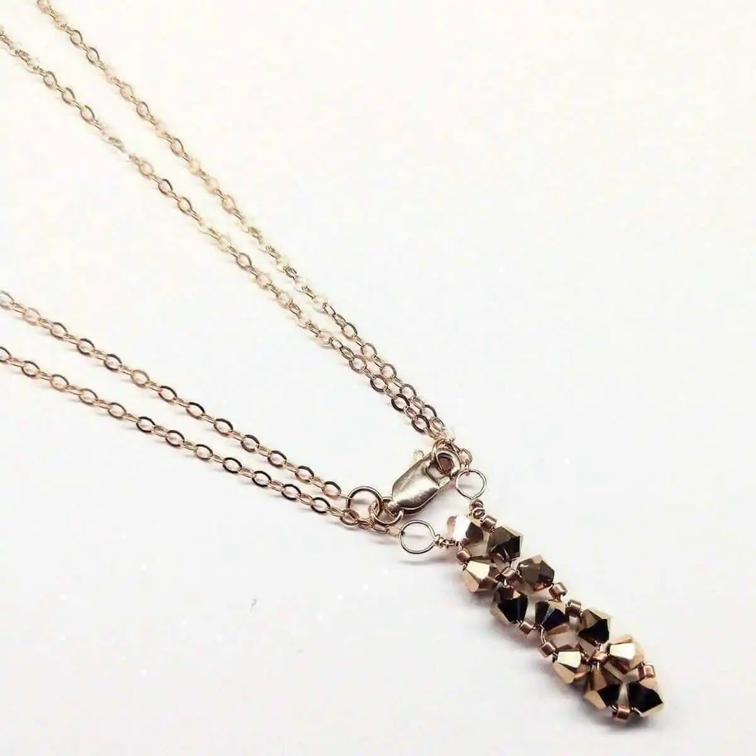 Super Sparkly Rose Gold Rock Candy Crystal Bar Necklace showcasing a vertical bar pendant with Swarovski crystals.