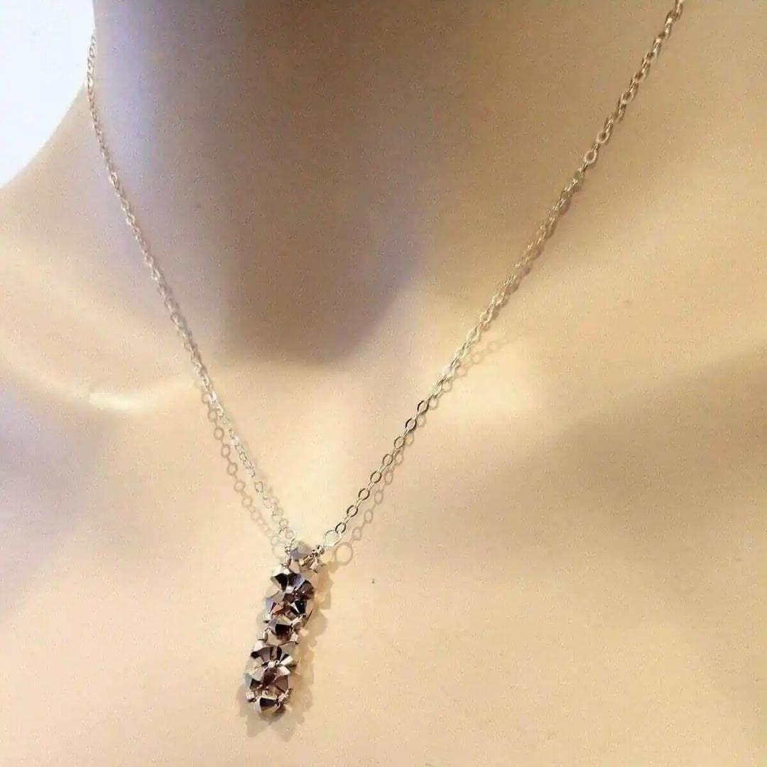 Super Sparkly Rose Gold Rock Candy Crystal Bar Necklace featuring dazzling Swarovski crystals on a silver chain.