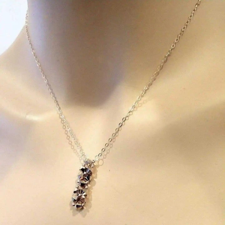 Super Sparkly Rose Gold Rock Candy Crystal Bar Necklace featuring dazzling Swarovski crystals on a silver chain.