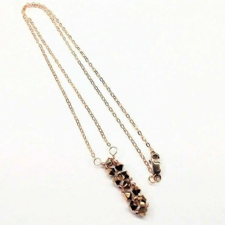 Super Sparkly Rose Gold Rock Candy Crystal Bar Necklace showcasing shimmering Swarovski crystals on a delicate chain.