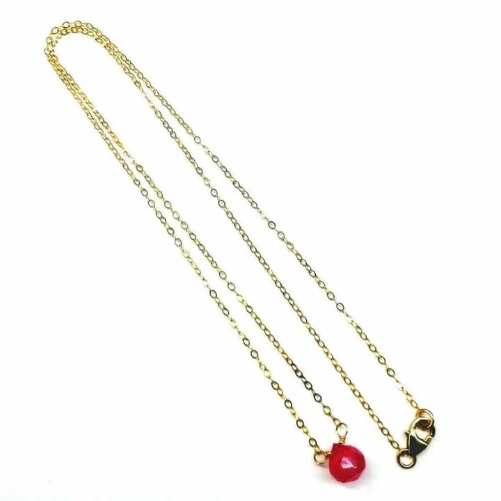Tiny Hot Pink Chalcedony Gold Filled Necklace displayed on a white background, featuring a vibrant chalcedony pendant and gold chain.