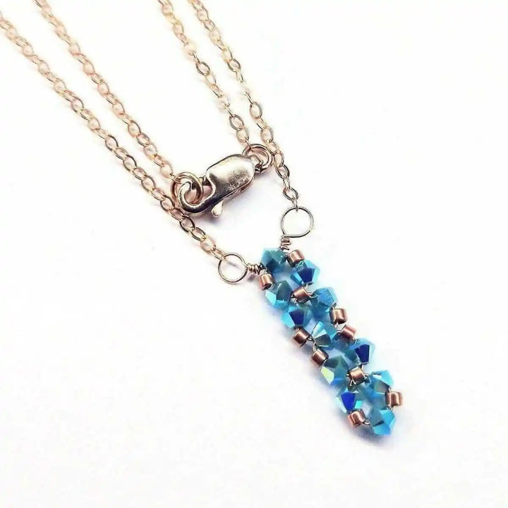 Tiny Super Sparkly Rock Candy Crystal Bar Necklace with turquoise Swarovski bicone crystals on a delicate chain.