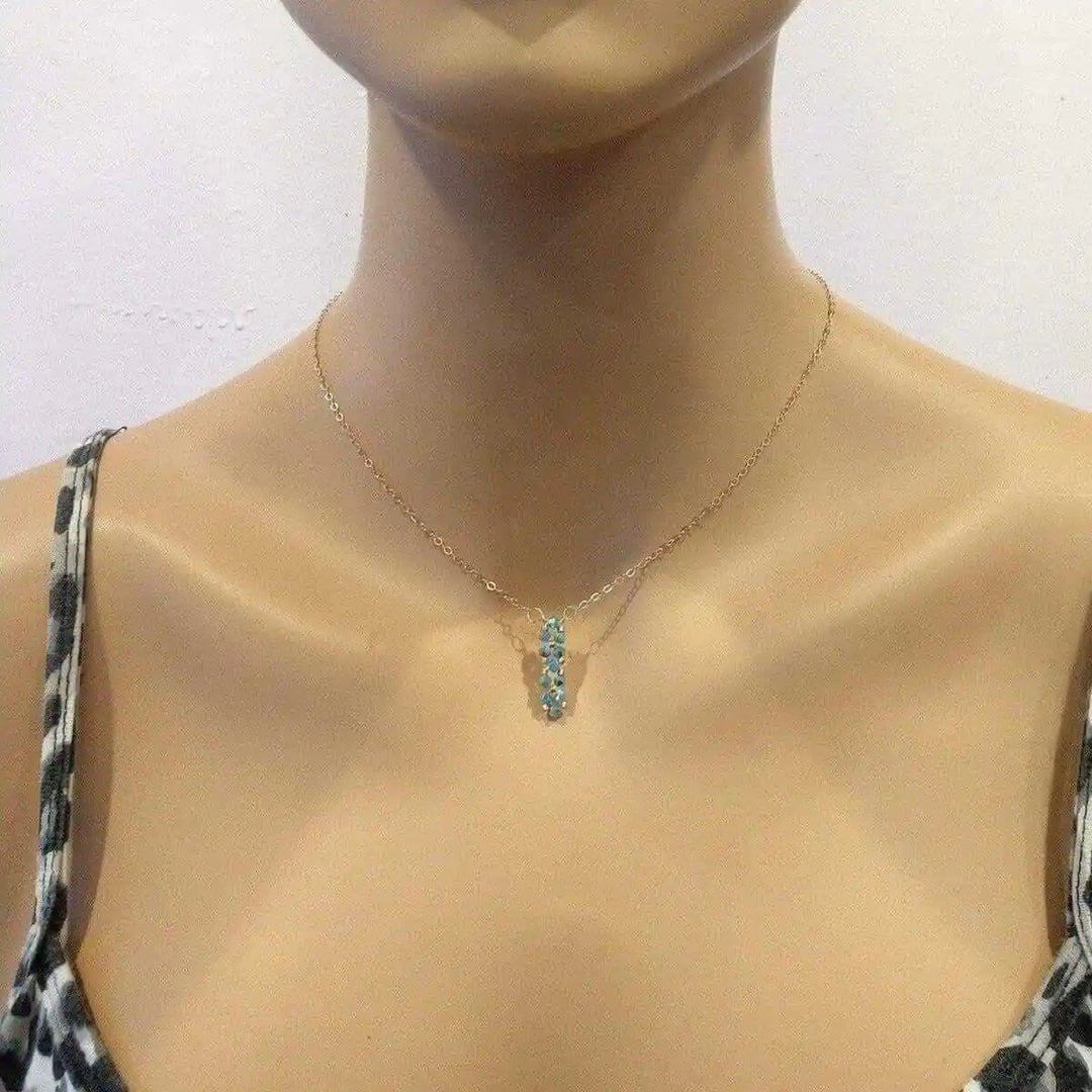 Tiny Super Sparkly Rock Candy Crystal Bar Necklace showcased on a mannequin, highlighting its sparkling design and elegant style.