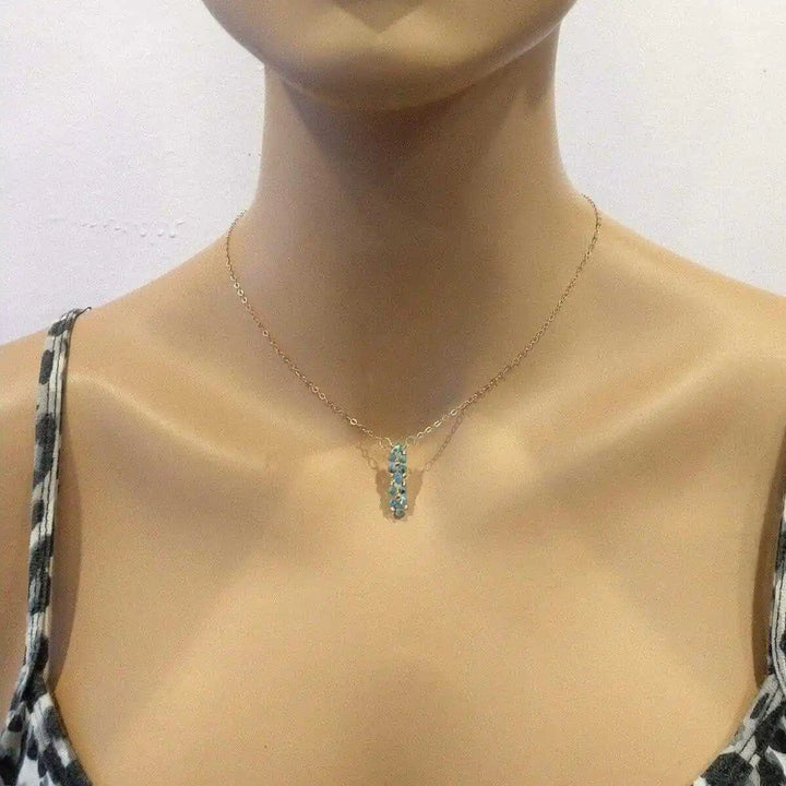 Tiny Super Sparkly Rock Candy Crystal Bar Necklace showcased on a mannequin, highlighting its sparkling design and elegant style.