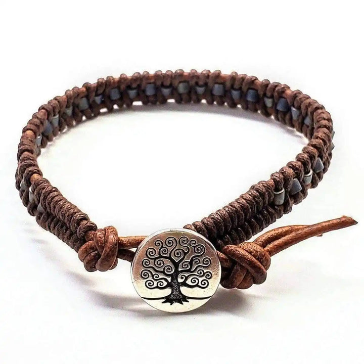 Handmade Tree of Life leather wrap bracelet with brown and gray seed beads, featuring a tree charm.