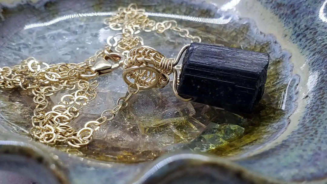 Spiritual and Devotional Products Collection featuring handmade black tourmaline necklace with gold chain.
