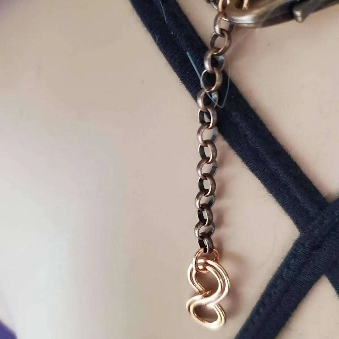 Close-up of the clasp detail on the Wire Wrapped Copper Turquoise Heart Infinity Charm Necklace showcasing artisan craftsmanship.