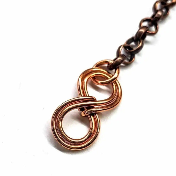 Wire Wrapped Copper Turquoise Heart Infinity Charm Necklace showcasing a copper infinity charm detail.
