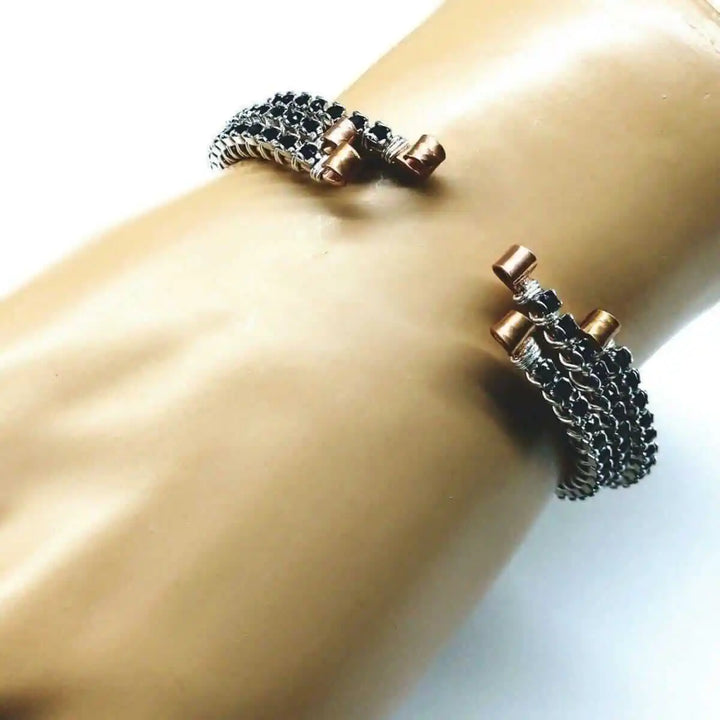 Wire Wrapped Copper Silver Black Crystal Rhinestone Bangle worn on a wrist with intricate design and sparkling crystals.
