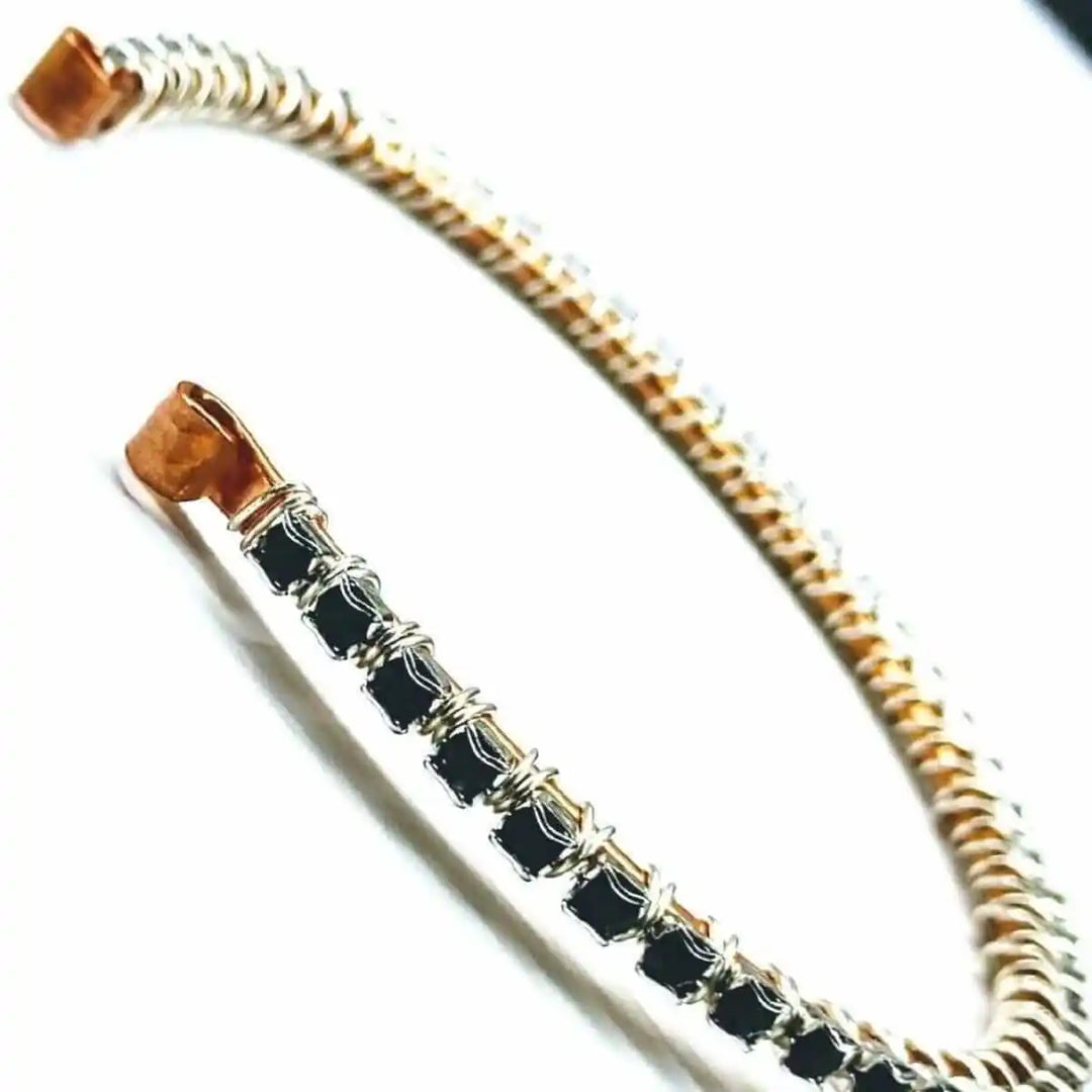 Wire Wrapped Copper Silver Black Crystal Rhinestone Bangle featuring jet black rhinestone crystals and elegant wire wrapping.
