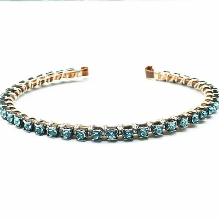 Wire Wrapped Turquoise Crystal Tennis Bangle Bracelet featuring aqua blue Swarovski-quality crystals on a hammered copper bangle.