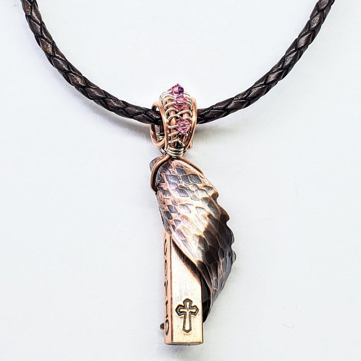 Sculpted Copper Angelwing Crystal Birthstone Necklace featuring a detailed copper pendant and braided cord.