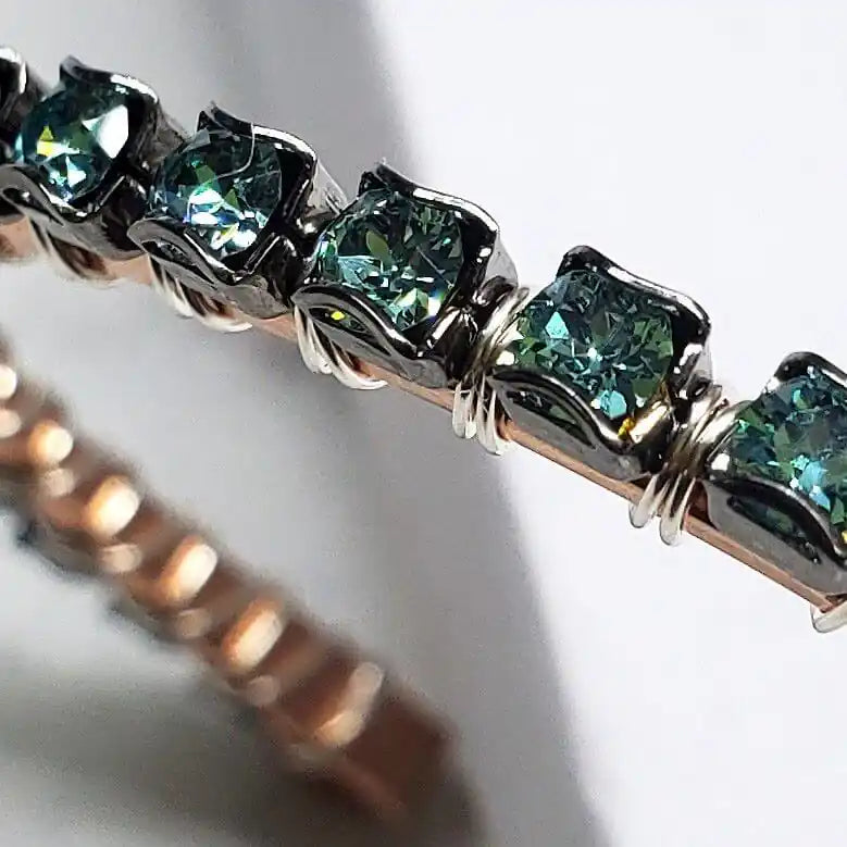 Close-up of the Wire Wrapped Turquoise Crystal Tennis Bangle Bracelet showcasing sparkling aqua blue Swarovski-quality crystals.