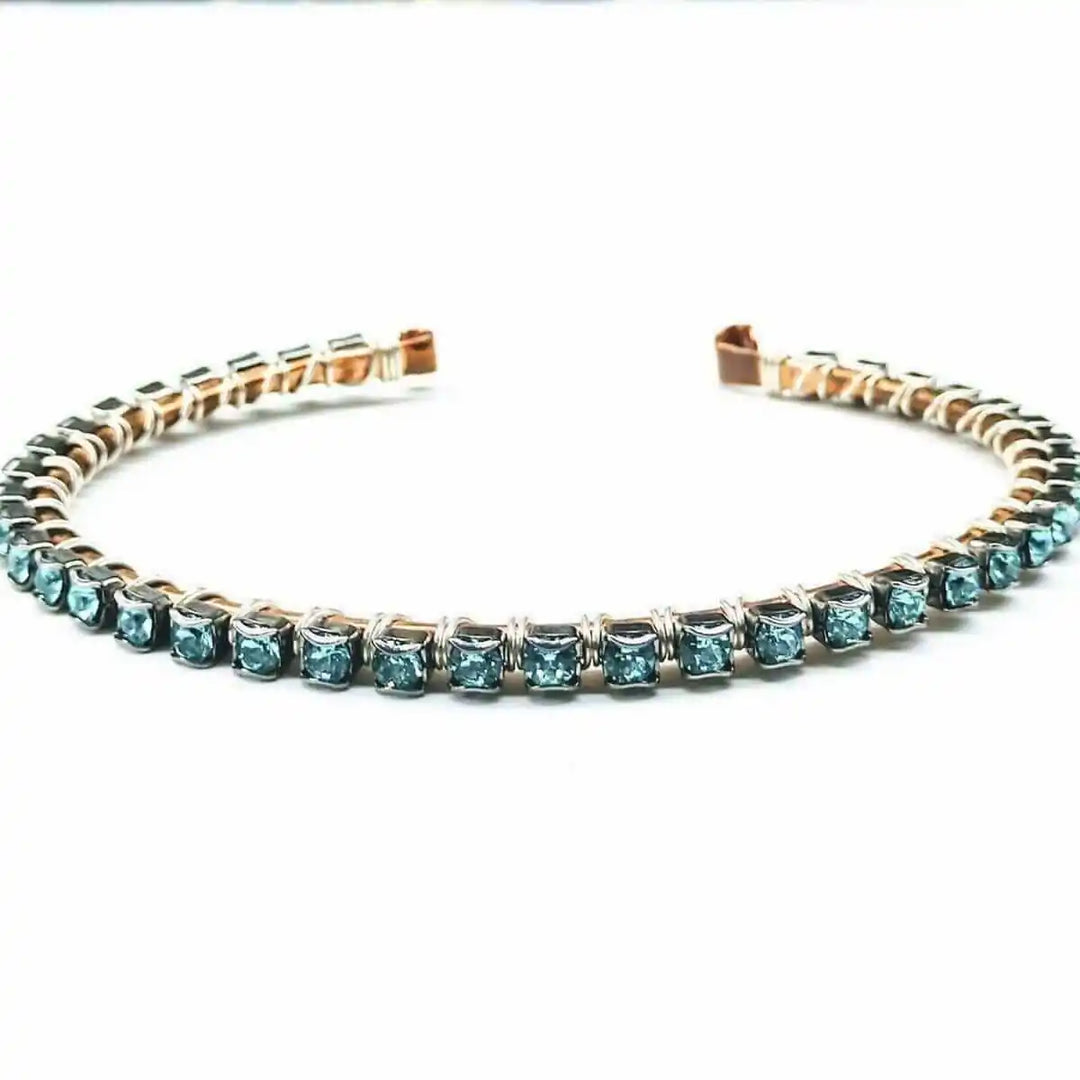 Wire Wrapped Turquoise Crystal Tennis Bangle Bracelet featuring aqua blue Swarovski-quality crystals on a hammered copper bangle.
