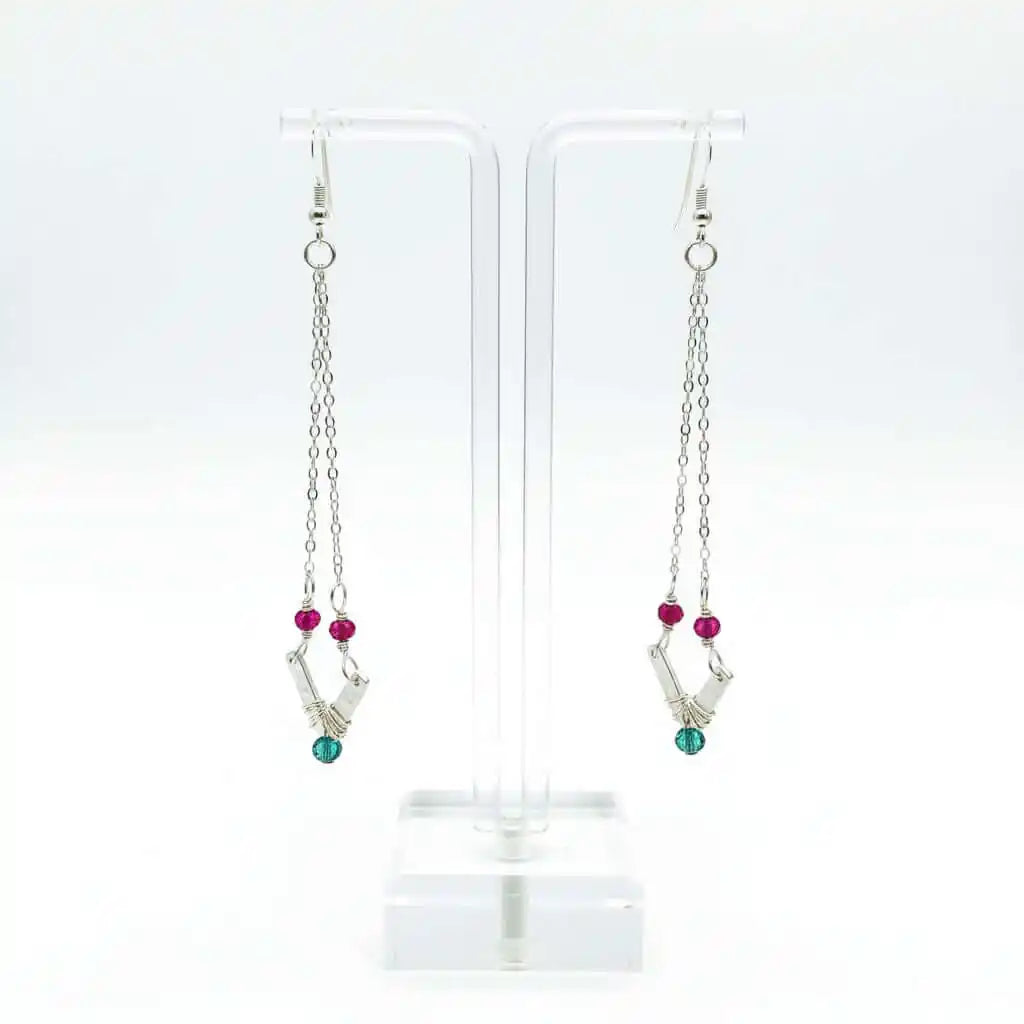 Sterling Silver Chevron Hot Pink Green Gemstone Earrings displayed on a clear stand with vibrant gemstones.