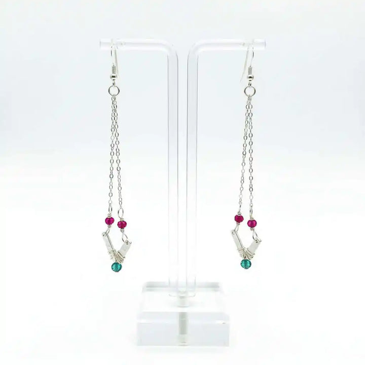 Sterling Silver Chevron Hot Pink Green Gemstone Earrings displayed on a clear stand with vibrant gemstones.