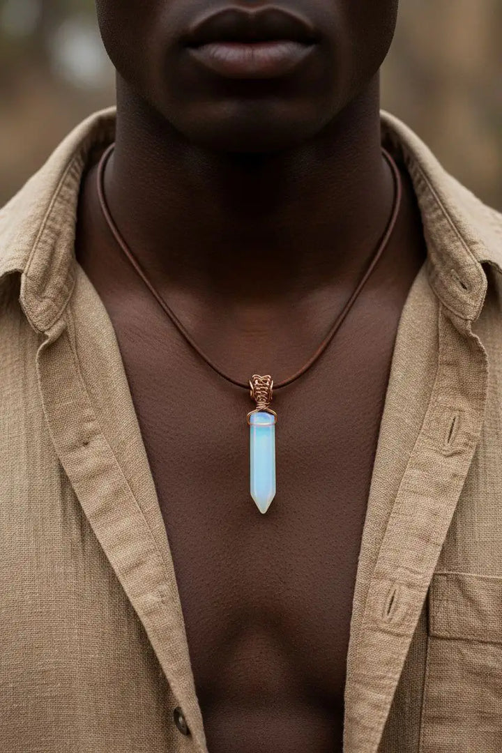 Handmade Rustic Wire Wrapped Gemstone Leather Necklace featuring wire-wrapped pointed gemstone on leather cord.