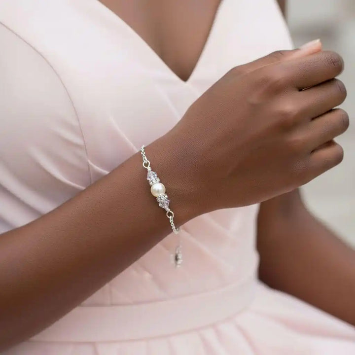 Silver Swarovski Crystal Pearl Bar Bridal Bracelet worn on a woman&