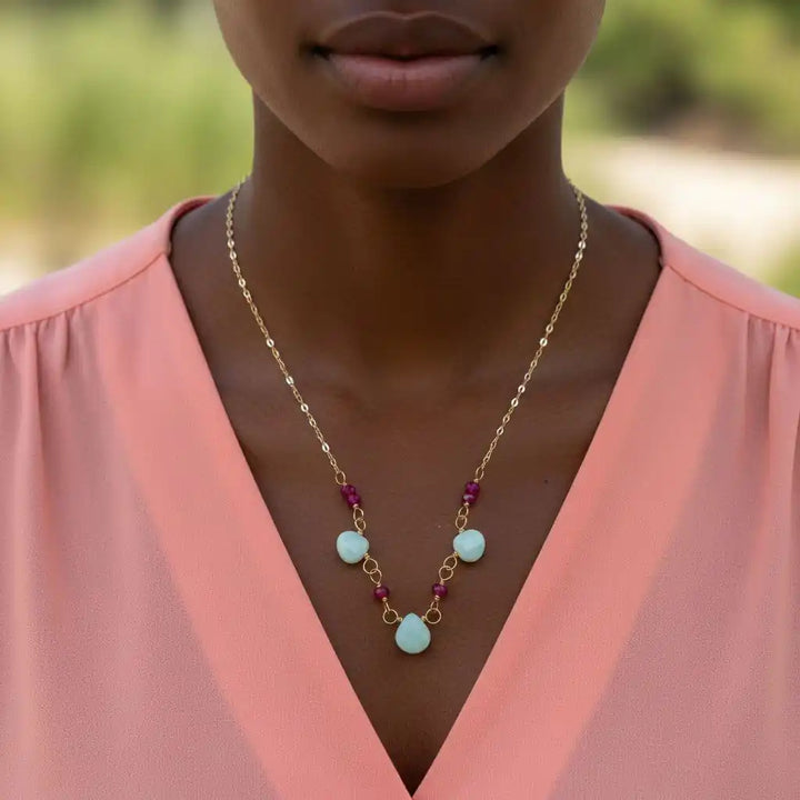 Dainty Gold Chain Mint and Hot Pink Gemstone Necklace worn by a model showcasing its elegant design.