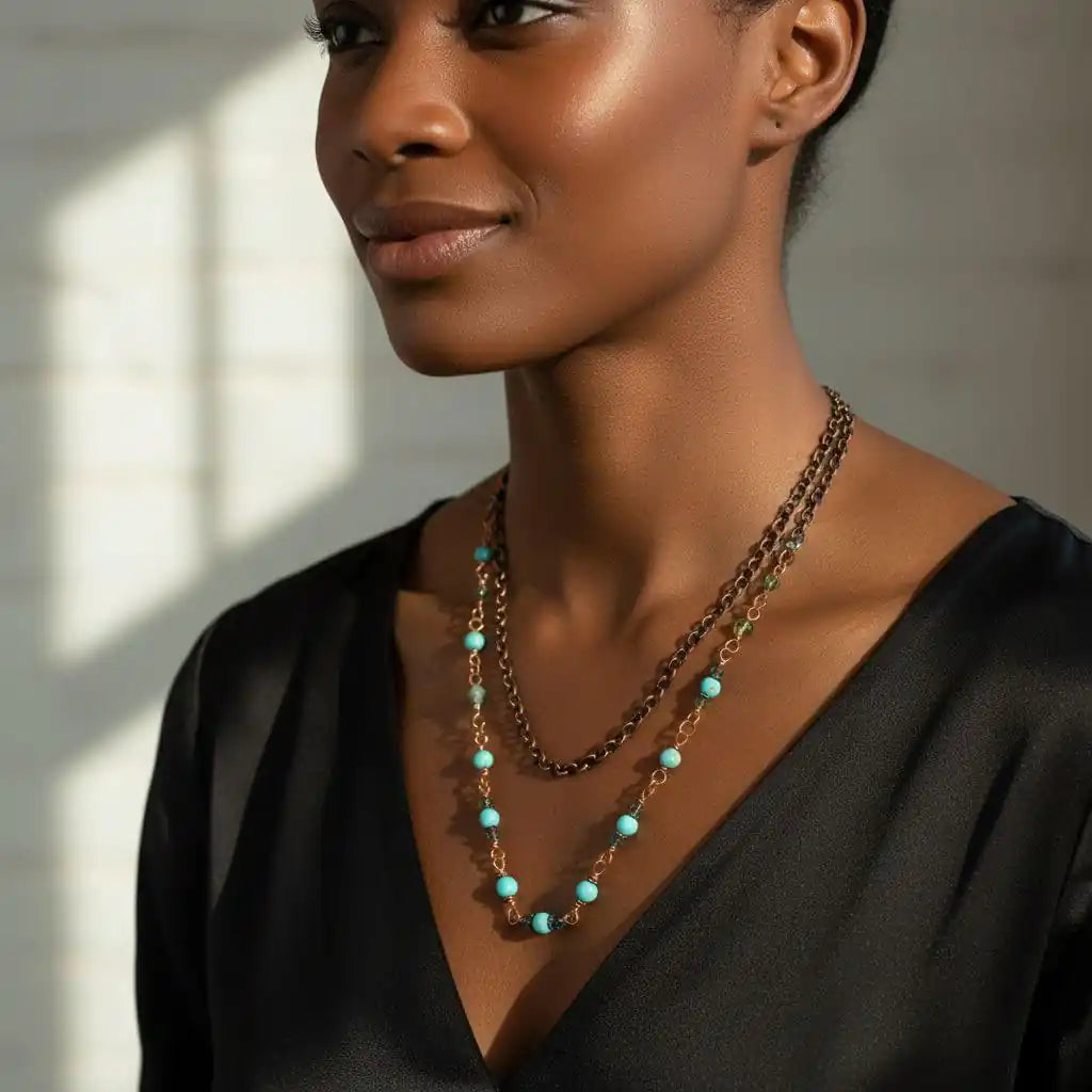 Wire Wrapped 24 Inches Copper Turquoise Necklace worn by a woman, featuring turquoise gemstones and sparkling crystals.