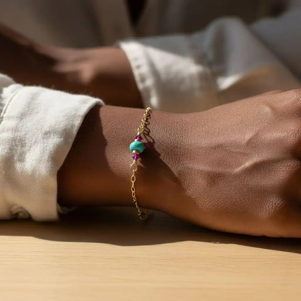 14K Gold Filled Pink and Turquoise Gemstone Dainty Bracelet worn on a wrist, showcasing vibrant colors and luxurious design.