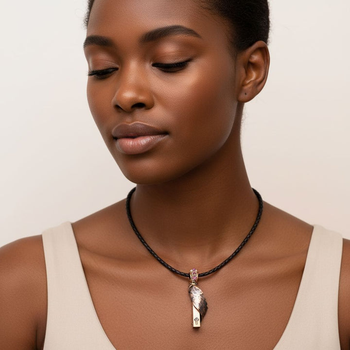 Model wearing a Sculpted Copper Angelwing Crystal Birthstone Necklace with a copper angel wing pendant.