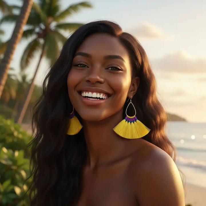 Handmade Hawaii Hula Skirt Rayon Silk Tassel Hoop Earrings worn by a smiling woman at the beach with palm trees.