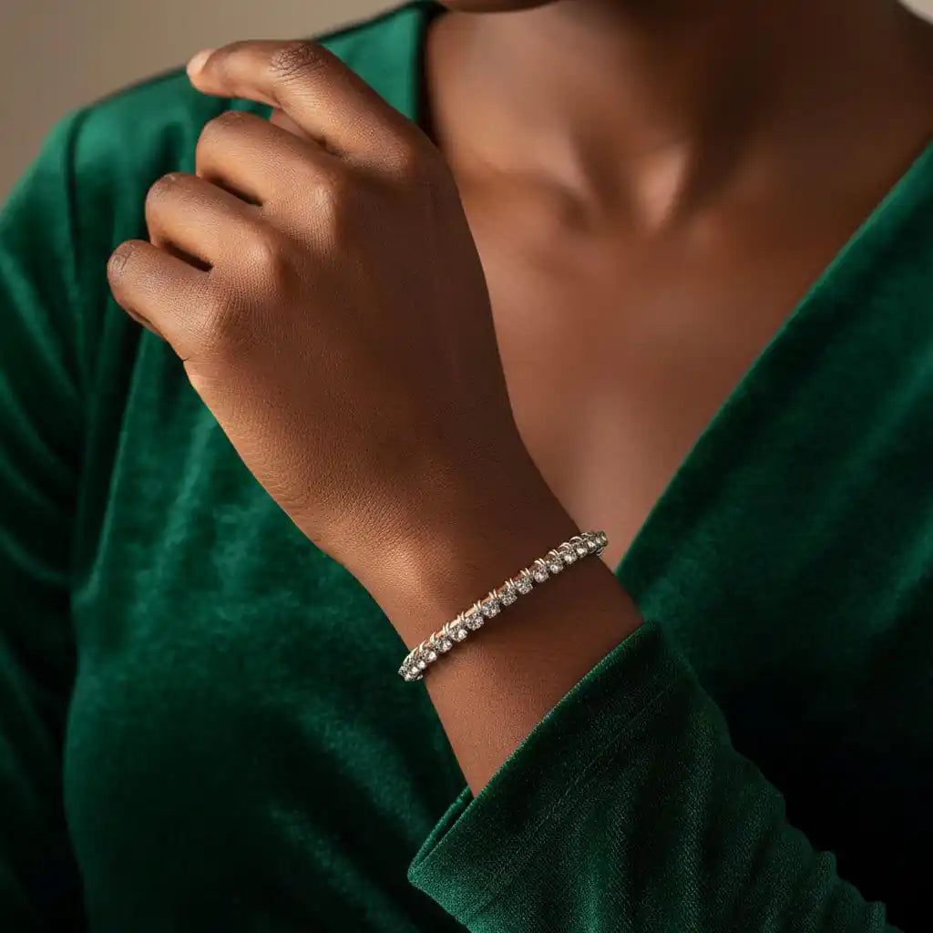 Catch-Free Crystal Rhinestone Tennis Bracelet Bangle worn on a stylish hand, complementing a green velvet dress.