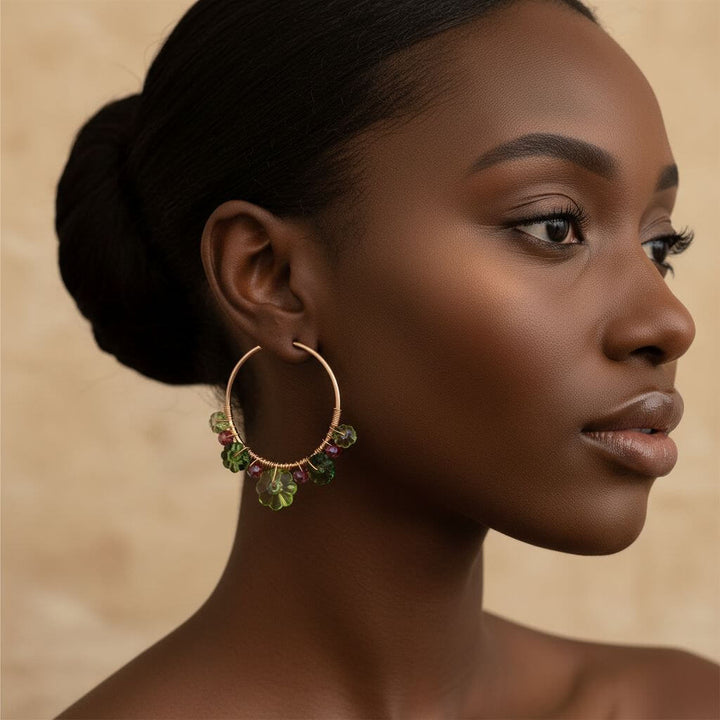 14 K Rose Gold Filled Red Green Holly Berry Crystal Hoops worn by a model, showcasing holiday elegance and sparkle.