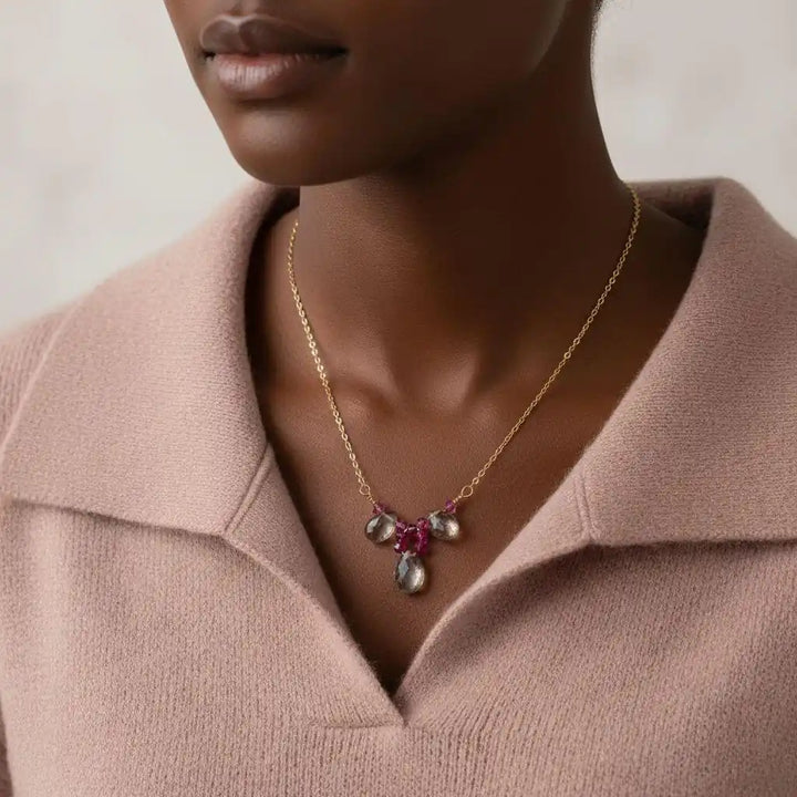 Adjustable Gold Filled Wire Wrapped Gemstone Necklace worn by a model, showcasing mystic rainbow quartz and fuchsia Swarovski crystals.
