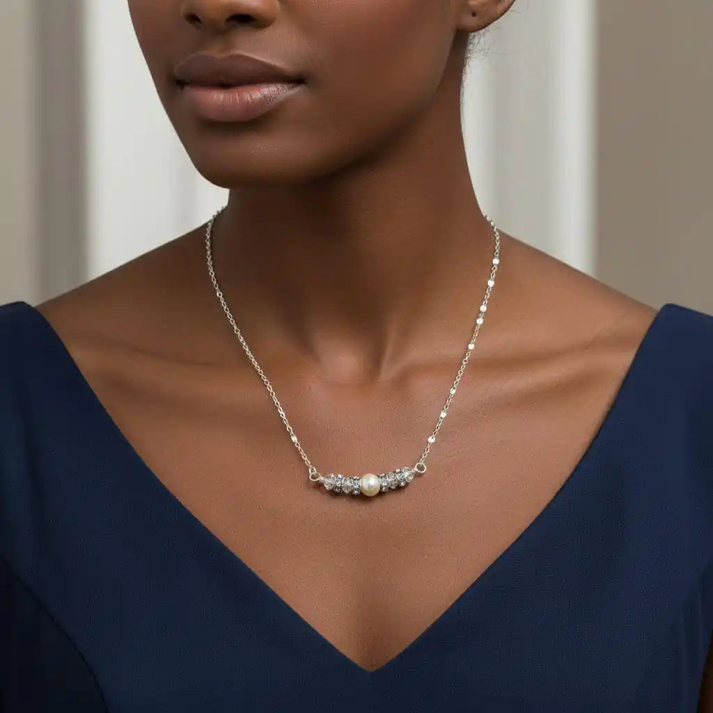 Silver Swarovski Crystal Pearl Bar Bridal Necklace worn elegantly by a model, showcasing its exquisite design.