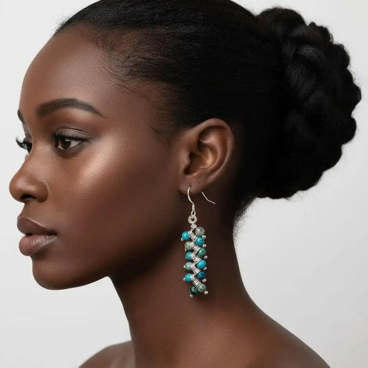 Seen On Jane The Virgin Silver Turquoise Wire Coil Earrings worn by a model showcasing bohemian elegance and artisan craftsmanship.