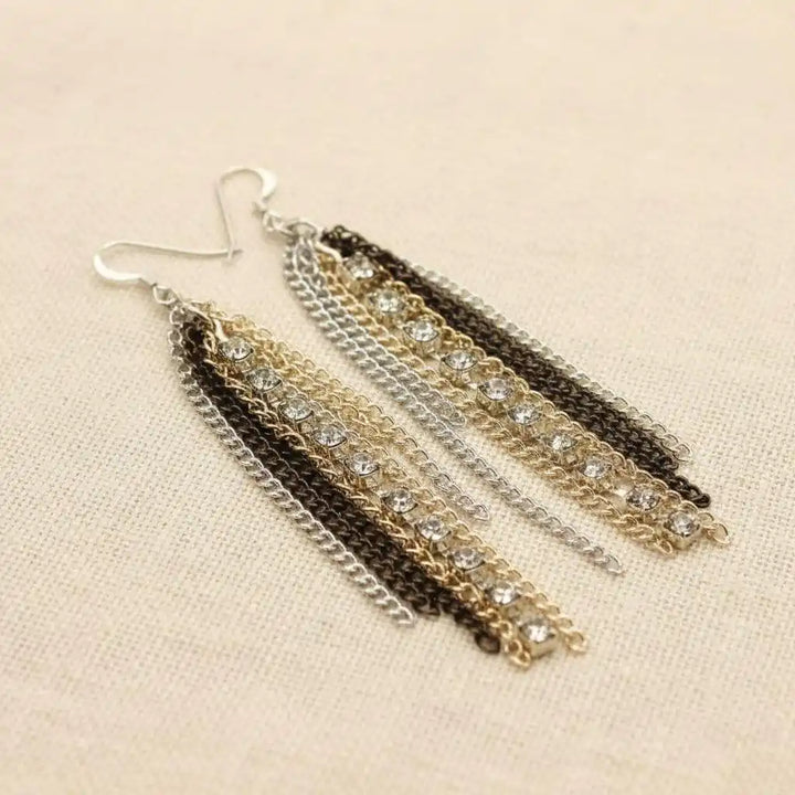 Rhinestone Crystal Chain Fringe Earrings featuring cascading mixed metal chains and sparkling rhinestones.