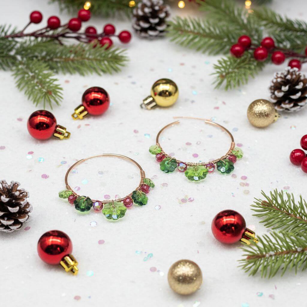 14 K Rose Gold Filled Red Green Holly Berry Crystal Hoops with festive holiday decorations.