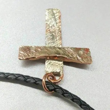 925 Silver Copper Hammer Forged Masculine Cross Necklace displayed with a black braided cord.