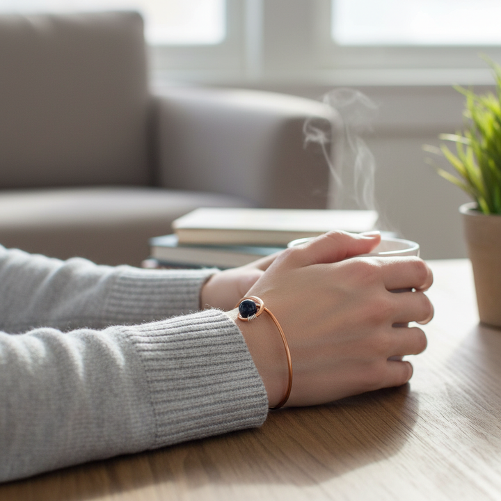 Woman wearing copper teardrop awareness bangle bracelet lifestyle photo