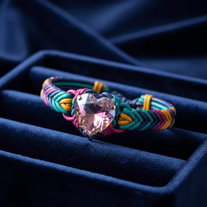 Tie-dye macrame bracelet on navy blue velvet tray