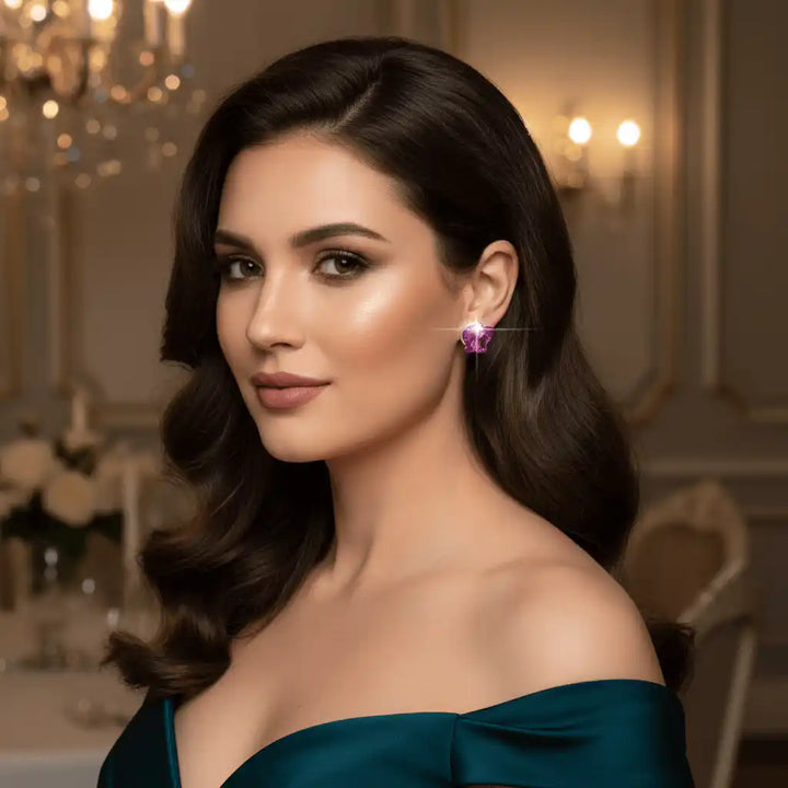 Woman wearing fuchsia butterfly crystal studs