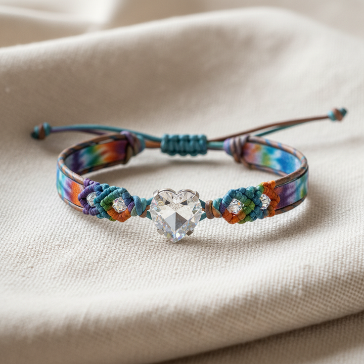 Tie-dye macrame leather bracelet on cream linen fabric