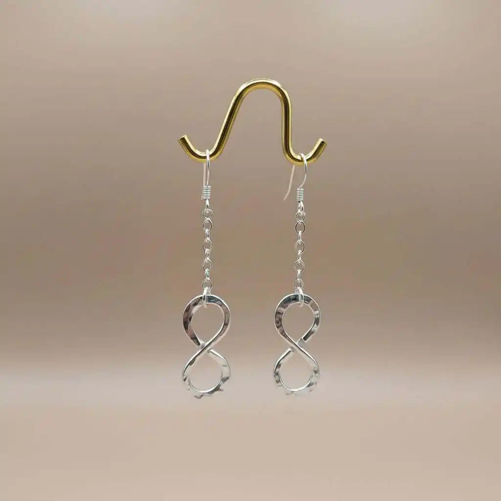 Sterling Silver Hammer Patterned Infinity Earrings showcasing the elegant infinity symbol with a hammer texture.
