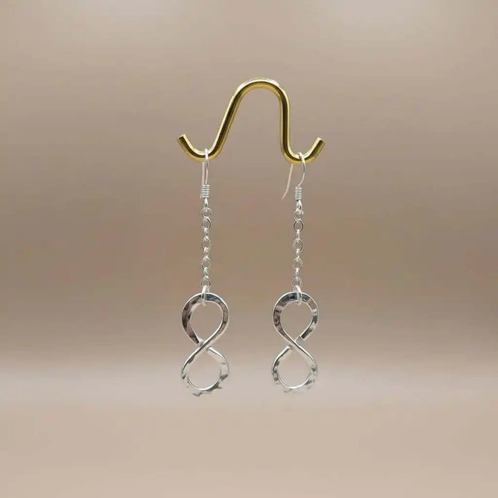 Sterling Silver Hammer Patterned Infinity Earrings showcasing the elegant infinity symbol with a hammer texture.