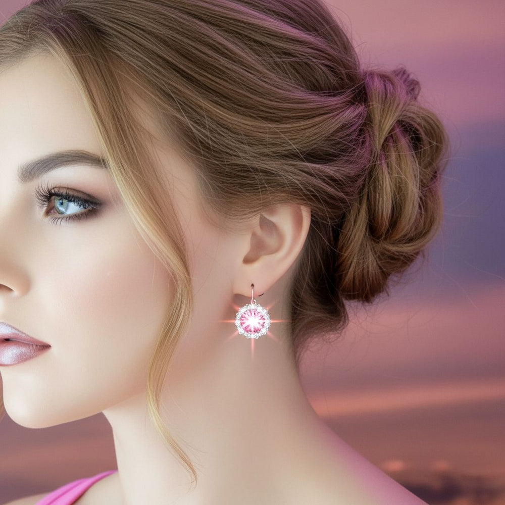 Close-up of a woman wearing Handmade Beaded Bezel Pink Crystal Halo Earrings featuring a Swarovski crystal.